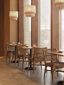 Cozy restaurant with wooden furniture, natural light, and a warm atmosphere