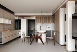 Modern kitchen and dining area with a wooden floor, white countertop, and dim lighting, featuring a dining table, chairs, and a bowl