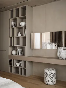 A modern living room with a wooden bookshelf, a glass mirror, and a potted plant, set against a neutral background and well-lit for a bright atmosphere