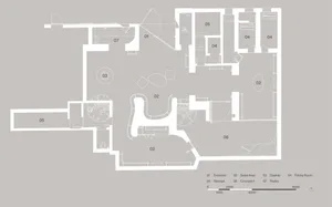 2D floor plan of a large open area with clean lines, minimal decoration, and dim lighting