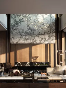 A modern living room with a marble fireplace, glass chandelier, and natural light from windows, featuring a couch, chair, and dining table