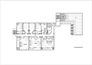 Black and white floor plan of a modern building with clean lines, minimal decoration, and clear layout