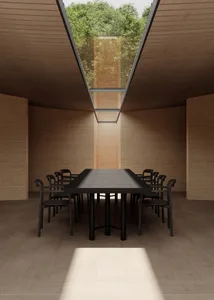 A well-lit dining area with a large wooden table and chairs, surrounded by a warm and inviting atmosphere