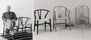 A dimly lit living room with two wooden chairs placed in the center, on a wooden floor, with a white wall in the background