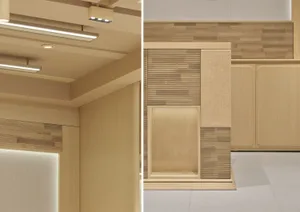 Clean modern bathroom with a wooden floor and white walls, featuring a sink and toilet