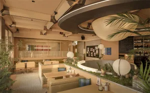 cozy restaurant interior with a circular dining table, potted plants, and a mix of natural and artificial lighting