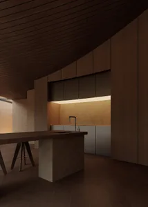 Wooden kitchen with a dining table, wooden counter, and dim lighting creating a cozy atmosphere