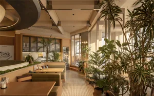modern restaurant with a large dining area, bar, and warm lighting, featuring wood and glass elements