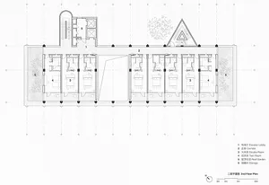 A simple and straightforward floor plan of a multi-story building with various rooms and spaces, focusing on layout and dimensions