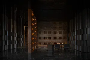 一間舒適的學習或休息區域，地板是木地板，餐桌和書櫃充滿著書籍，營造著溫暖和親切的氣氛
