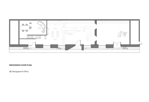 Detailed modern floor plan of an open space with a staircase, kitchen, and living room, featuring concrete and steel construction, clean lines, and natural lighting