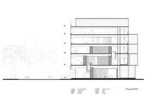 Black and white floor plan of a large building with a mix of residential and commercial areas, featuring a minimalist style and dim lighting