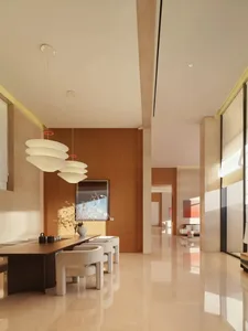 Bright and modern living space with a dining area, kitchen, and various furniture pieces, decorated with wood and metal, and featuring a clean contemporary style