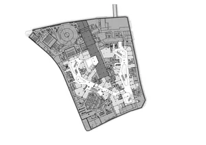 2D floor plan of a modern commercial building with multiple rooms and spaces, featuring clean lines, labels, and measurements, with natural sunlight streaming in through windows