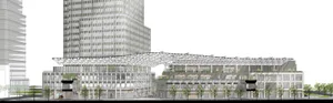 A modern commercial building with a large glass roof, surrounded by trees, creating a spacious and open atmosphere