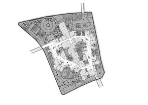 A modern building floor plan with clean lines, minimal decoration, and predominantly white colors, featuring natural lighting and a bright, open feel