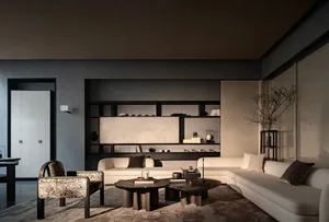 A modern living room with a white couch, a glass dining table, and a wooden floor, decorated with various items and well-lit with natural light