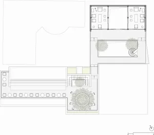 White floor plan of a modern lobby with a circular design, featuring furniture and a focus on functionality and aesthetics