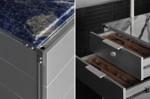 A dimly lit kitchen with a blue marble countertop and a metal cabinet, creating a moody atmosphere