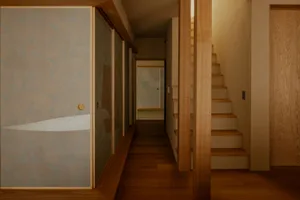 A dimly lit hallway with a wooden floor and staircase, featuring modern clean lines and minimal decoration, with natural light from windows