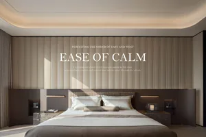 Modern luxury bedroom featuring a large bed with white and beige linens, a tall vertical beige panel accent wall, dark walnut floating nightstands and headboard unit, and curved ceiling cove lighting.