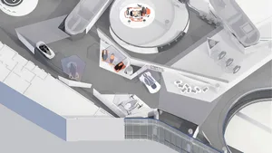 Top-down architectural rendering of a modern automotive exhibition space featuring multiple concept cars displayed on white platforms and within glass enclosures.
