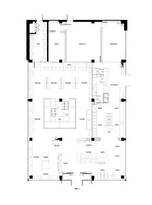 Black and white architectural floor plan of a large multifunctional commercial space including bakery, cafe, bookstore, and various retail zones with Chinese labels.