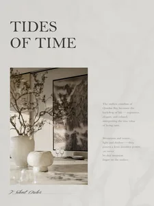 Modern dining room featuring a large black and white Chinese mountain ink painting, white marble table, textured ceramic vases with dried branches, and soft natural lighting.