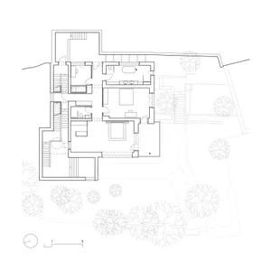 Black and white architectural floor plan of a large two-story contemporary house featuring multiple bedrooms, bathrooms, living areas, staircases, and surrounding garden with mature trees.