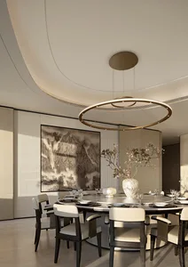 Modern luxury dining room featuring a large round marble table, dark wood and cream dining chairs, a contemporary circular chandelier, and a large Chinese ink wash painting of misty mountains.