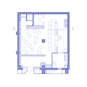 Technical floor plan of a restaurant featuring a large open dining area with round tables, a long service bar, kitchen, and restrooms.