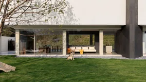 Modern concrete villa exterior featuring a large open patio with white outdoor sofa, wooden dining area, and a husky dog sitting on a green lawn in the foreground.