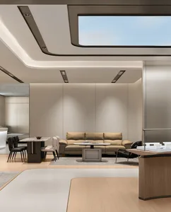 Modern minimalist living room featuring a beige leather sofa, oak wood flooring, marble dining table, black leather chairs, and a large rectangular skylight in a coffered ceiling.