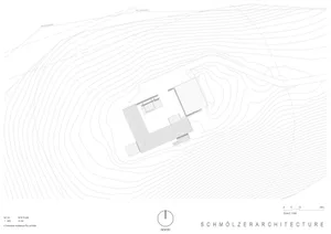 Black and white architectural site plan showing a house layout integrated with dense topographic contour lines on a sloped site, with north arrow and scale.