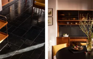 Split view of a modern dining room featuring glossy black slate tile flooring, a wooden bar cart, mustard-yellow dining chairs, and a mid-century teak wood hutch with glass display cabinets.