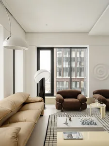 Modern living room with a beige leather sofa, two brown velvet armchairs, a black and white geometric rug, chess table, and large arched floor lamp in front of a city-view window.