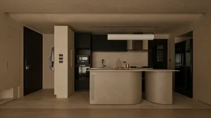 Modern minimalist kitchen with a large curved micro-cement island in warm beige tones, dark cabinetry, and soft ambient lighting