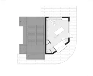 Black and white architectural floor plan of a modern house featuring a curved brick exterior wall, central courtyard, staircase, and various living spaces.