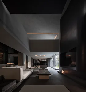 Modern minimalist double-height living room featuring raw concrete walls, a long linear fireplace with visible flame, light grey modular sofas, a dark coffee table, and a grand piano in the distance under dramatic architectural lighting.