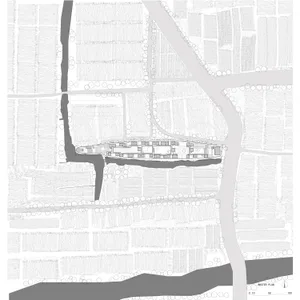Black and white architectural master plan drawing showing a long linear building complex positioned along a dark river edge, surrounded by tree symbols and urban block patterns.
