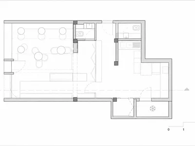 Black and white architectural floor plan of an L-shaped restaurant featuring dining tables, kitchen, restrooms, and service counters with scale in meters.