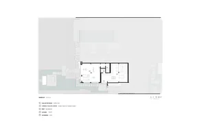 黑白建築平面圖，顯示地下層 Subsolo Level 0 配置，包含入口大廳、家庭劇院、健身房、浴室與廁所。