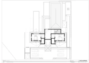 Black and white architectural first floor plan drawing of Kalrav Nest Goldfinch Villa, displaying two bedrooms, staircases, and parking area.