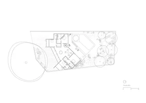 Black and white architectural site plan of a modern villa featuring a large circular driveway, swimming pool, landscaped garden with mature trees, and detailed floor layout.