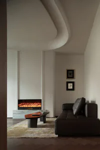 Modern minimalist living room with dark leather sofa, organic curved ceiling, marble electric fireplace, and neutral color palette.